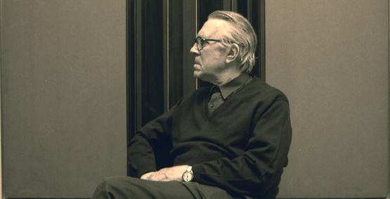 Luc Peire devant son tableau,  sitting in his studio . Paris 1993